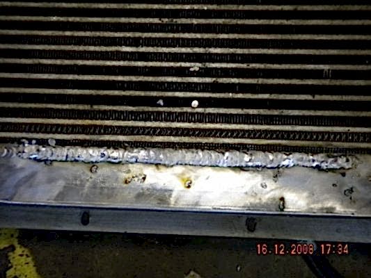 Ремонт масляного радиатора аргонной сваркой. Цена ремонта: 1200р.